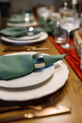 Beautiful and stylish table setting festive decorations in the living room.