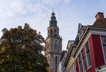 The famous Martinitoren in the city of Groningen on an autumn morning. - obrazy, fototapety, plakaty