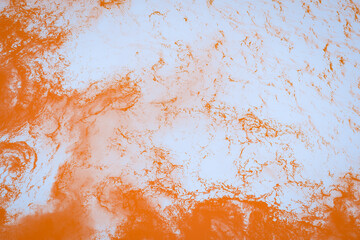 Orange fiery and white abstract blurred background