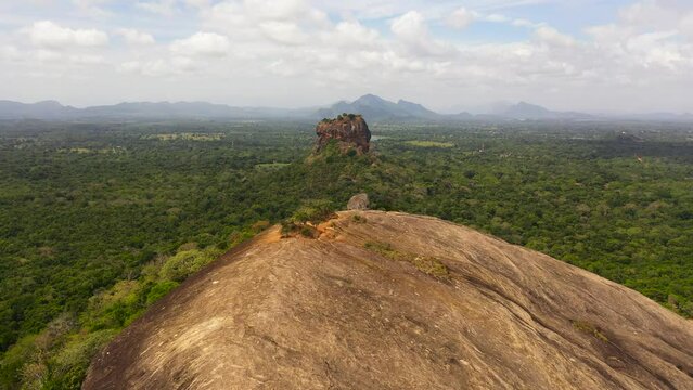 Sigiriya Rock with a fortress and Pidurangala rock is a famous tourist place in Sri Lanka.
