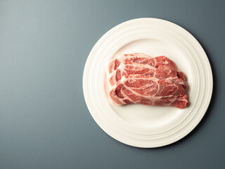 fresh Pork Neck  on a plate