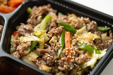Various side dishes and bulgogi lunch box	