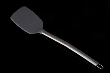 non stick kitchenware spatula on black background