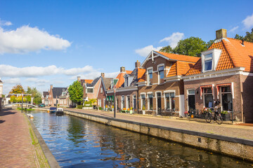 Obraz premium Old houses at the central canal of Kollum, Netherlands