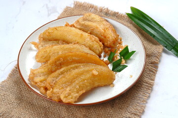 Pisang goreng or fried banana. popular street food in South East Asia, especially in indomesia...