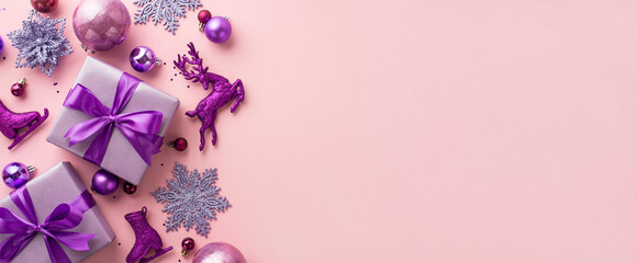 New Year concept. Top view photo of violet gift boxes with ribbon bows pink purple baubles...