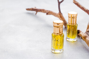 Perfume essential oil in glass bottles. Traditional Arabian incense
