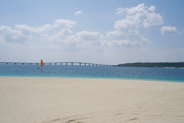 Sandy beach of Yonaha Beach and Kurima Bridge leading to Kurima Island