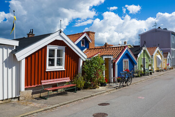Colorful wooden houses in Bjorkholmen, the oldest district of Karlskrona, Sweden - 541479001