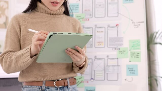 Woman, ux design and tablet planning, website developer mobile app wireframe and business analytics for technology innovation. Creative web designer, digital brand management and storyboard strategy