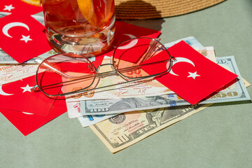 Turkish flag and money lira and dollars. Vacation in Turkey.