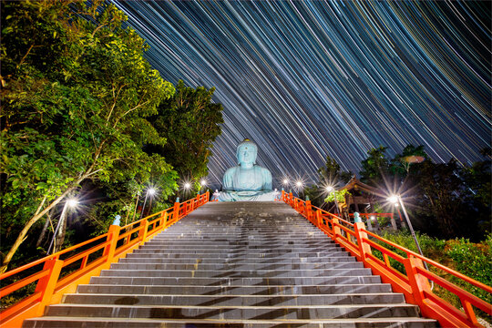 beautiful Star Trails on Wat Doi Phra Chan Buddhist temple the city of Mae Tha in Lampang,Thailand.