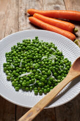 Peas cooked with onion and carrots