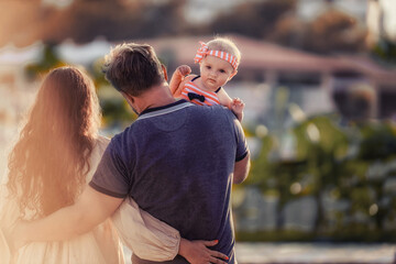 Fototapeta premium couple with baby on the beach