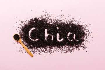 chia word made from chia seeds top view on colored background. Healthy superfood