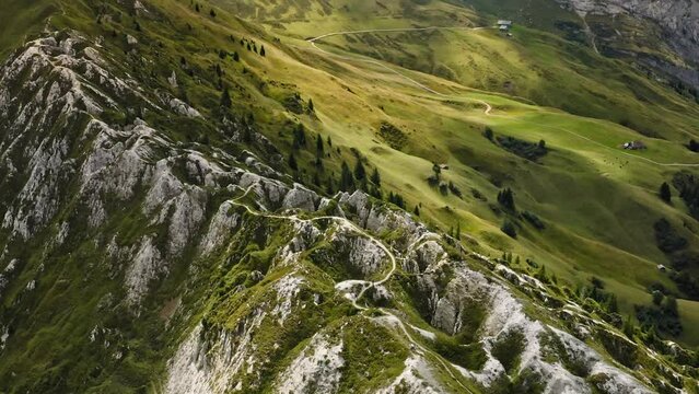 Drone view of a landscape of green mountains in the daytime