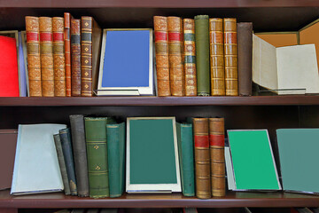 Old books on wooden shelves