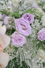 Wedding ceremony in the chapel for intimacy family and friends. Sunny outdoors afternoon natural light. Flowers arrangement for decoration details.