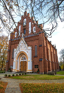 General view and architectural details of the brick belfry built in 1875 and the Catholic Church of the Immaculate Conception of the Blessed Virgin Mary in Ceranów in Mazovia, Poland.
