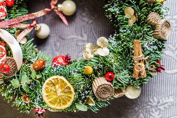 Fototapeta na wymiar Beautiful Christmas wreath with ribbon