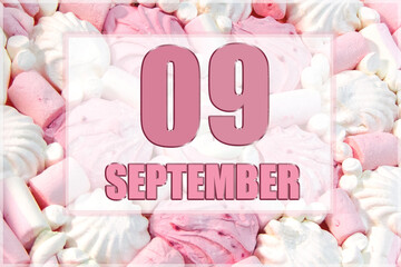 calendar date on the background of white and pink marshmallows. September 9 is the ninth day of the month