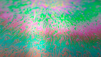 Photo of iridescent surface of soapy water. Space, halographic, psychedelic background for...