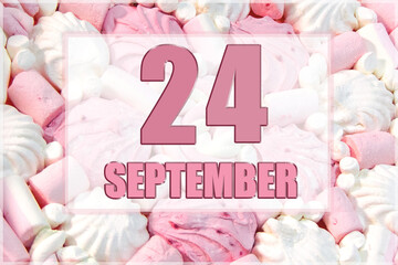 calendar date on the background of white and pink marshmallows. September 24 is the twenty-fourth  day of the month