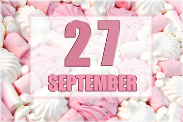 calendar date on the background of white and pink marshmallows. September 27 is the twenty-seventh day of the month