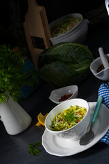 White cabbage with dill and diced bacon