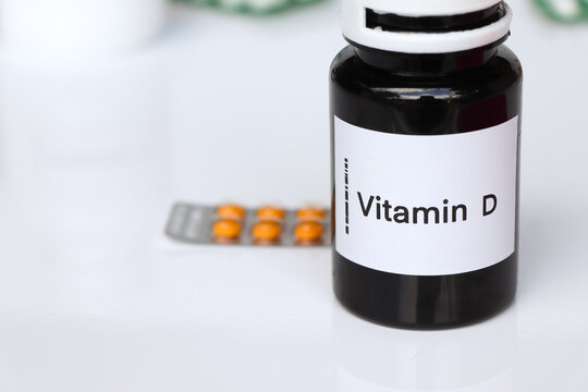 Vitamin D pills in a bottle, food supplement or used to treat disease