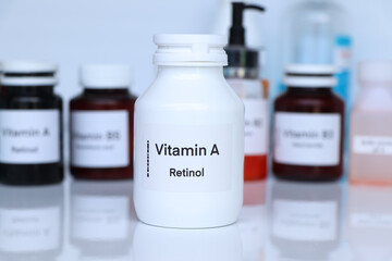 Vitamin A pills in a bottle, food supplement or used to treat disease