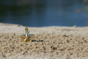 Christmas on the beach. Travels. Christmas background with christmas decorations on the sand.