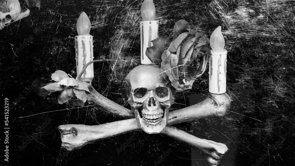 Poster skull-and-bones candlestick with flashing white scratches