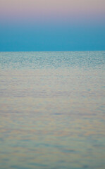 The surface of the water in the Issyk Kul mountain lake in Kyrgyzstan at sunset