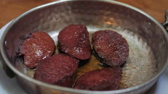 Turkish Sausage Sucuk in Frying Pan for Breakfast.