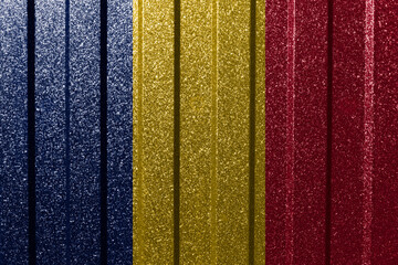 Textured flag of Chad on metal wall. Colorful natural abstract geometric background with lines.