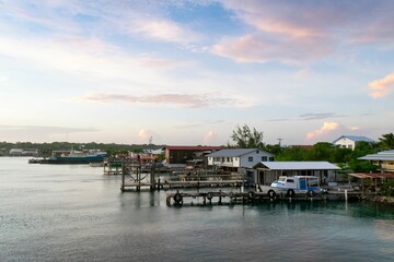 Beautiful shot of a harbor in Utila Island, Honduras during unset