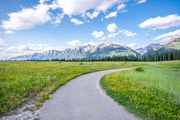 Trans Canada Trail Hike Paved Pathway in Rocky Mountains, Canmore, Alberta. High quality photo