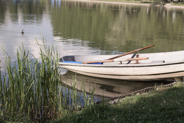 Empty boat near the lake in the summer