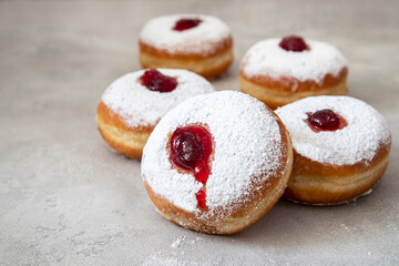 Jewish holiday hannukah symbols - donuts with jam	