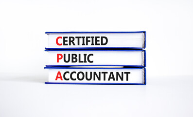 CPA certified public accountant symbol. Concept words CPA certified public accountant on books on a...