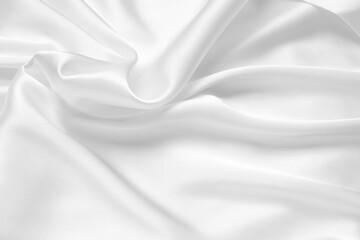 Smooth elegant white silk or satin luxury cloth texture can use as wedding background. Luxurious background design.