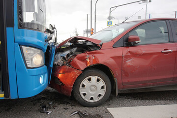 Frontal collision of a car and a bus.  Head-on collision between bus and car. Car accident. Traffic...