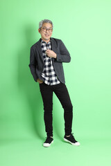 Obraz premium Asian Man on Green