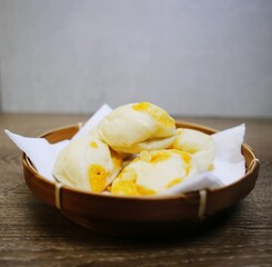 Front view of cheese buns on plate