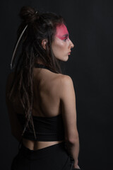 Ethnicity, tribe, make-up concept. Beautiful native American Indian woman portrait. Model with...