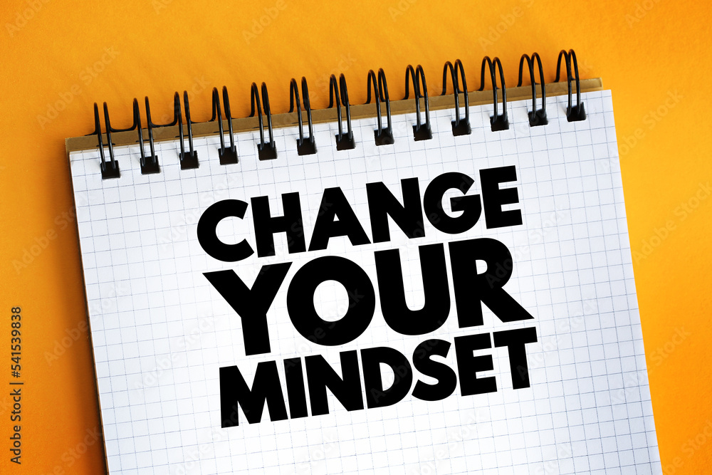 Poster change your mindset text on notepad, concept background