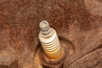 worn out spark plugs of a scrap car