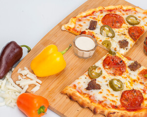 pizza with salami and tomatoes