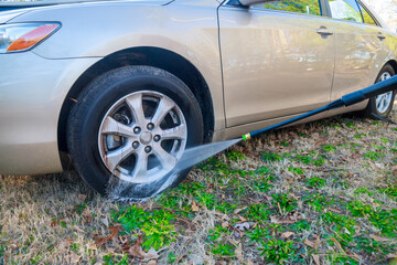 During the washing process, use a car wash sprayer with water.